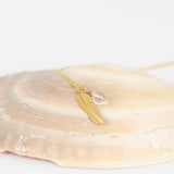 Fjer-Heiring_rutil-kvarts halssmykke hos Shining You