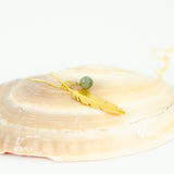 Fjer-Heiring_rutil-kvarts halssmykke hos Shining You