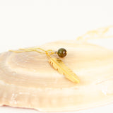 Fjer-Heiring_rutil-kvarts halssmykke hos Shining You