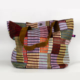 Mønstret net i kraftigt vævet stof syet af eva-m