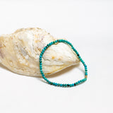 Armbånd med turkis og 14 k guld