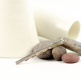 EVA LUNDTORP- LINES slipsenål hos Shining You